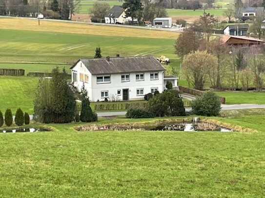 Einfamilienhaus mit Einliegerwohnung in landschaftlich reizvoller Alleinlage am Fuße des Wieh