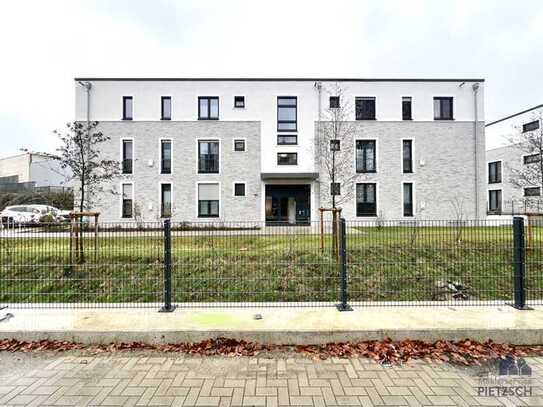 Neubau-Erdgeschosswohnung mit Tiefgaragenstellplatz mitten in Marl-Hüls!