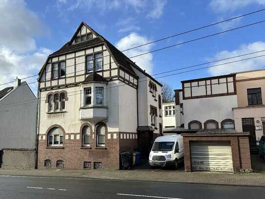 JA, zum vermieteten Wohnhaus mit solider Werkstatt/Halle in Solingen-Mitte