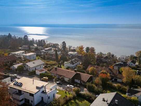 Exklusives Doppelhausanwesen mit Einliegerwohnung, außergewöhnlicher Raumhöhe & Seeblick in Top-Lage