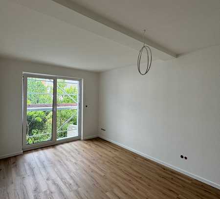 Sanierte 4 Zimmerwohnung mit großer Terrasse im 1. Obergeschoss