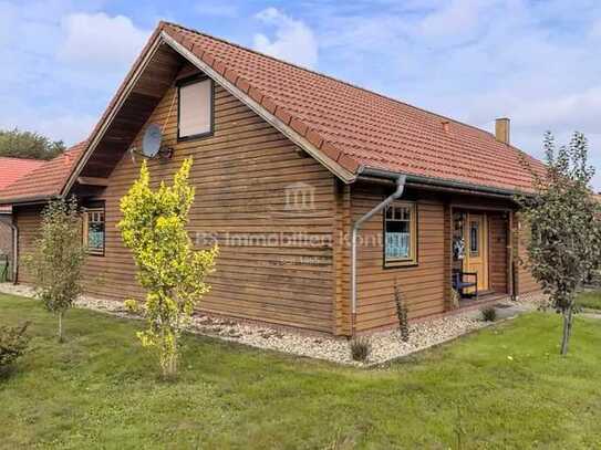 Gemütliches Holzhaus mit großzügiger Raumaufteilung und Carport in Sackgassenlage