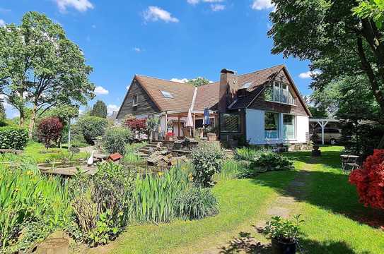 Großzügiges und individuelles Landhaus auf parkähnlichem Grundstück in bester Lage von Neuss Selikum