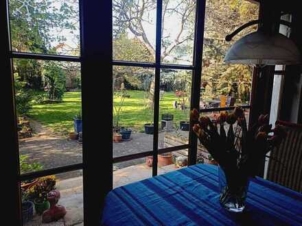 Einzigartiges Haus mit paradiesischem Garten