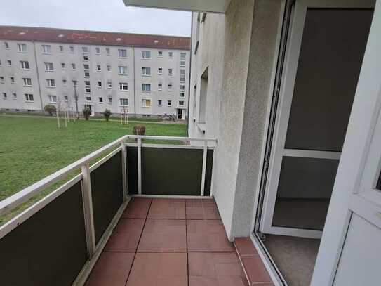 Erdgeschosswohnung mit Balkon