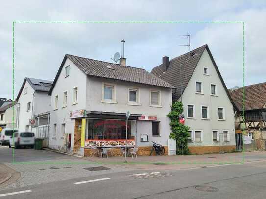 Walzbachtal: Anlageimmobilie 4 Wohnungen plus Gewerbe, Abrissgebäude für Garten und Stellplätze