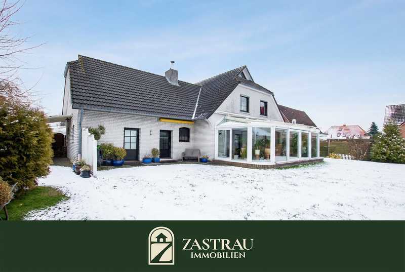 Wohnen, wo die Ruhe zuhause ist – Einfamilienhaus mit Wintergarten in Ostfriesland