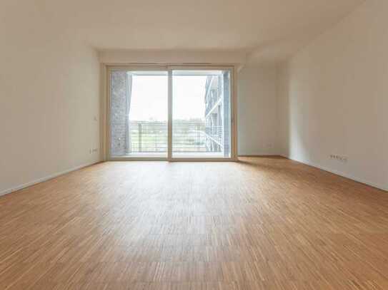 Wasserblick inklusive – Wohngenuss auf 50 m² | Balkon | Offene Küche | HWR | Bad mit Dusche | Aufzug