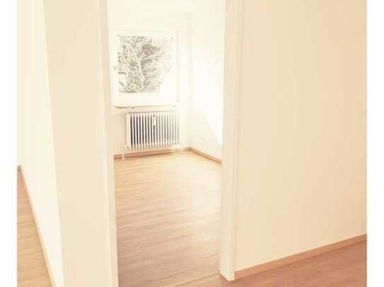 Helle Dachgeschosswohnung mit großem Südbalkon in Harlaching