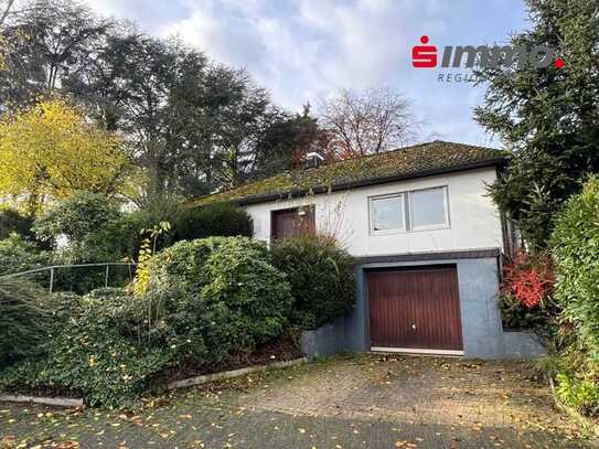 Sanierungsbedürftiger Bungalow mit großem Grundstück und angrenzender Pferdewiese