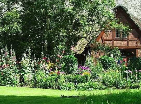 Einfamilien-Reihenmittelhaus mit Garage und Garten