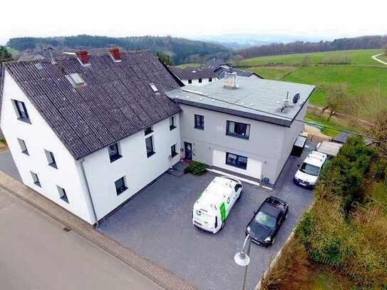 Einheit aus Luxus und Existenz.Exklusives EFH, 6 Ferienapartm. 4 Garagen in Rodder, Nähe Nürburgring