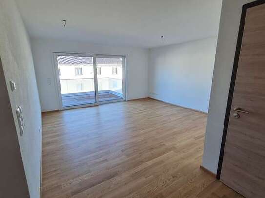 Erstbezug einer gemütlichen 2 Zimmerwohnung incl. Balkon und breitem Tiefgaragenplatz