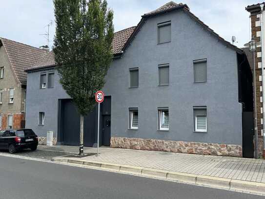 Mehrfamilienhaus mit 4 Wohnungen + Scheune +Ausbaupotential in Großostheim zu VERKAUFEN