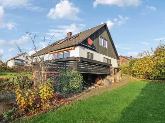 Gemütliches Ein- bis Zweifamilienhaus mit sonnigem Grundstück in bevorzugter, ruhiger Lage