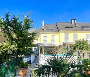 Düsseldorf- bei Benrath: exklusives Reihenmittelhaus mit Pool, Kamin und optimaler Raumaufteilung