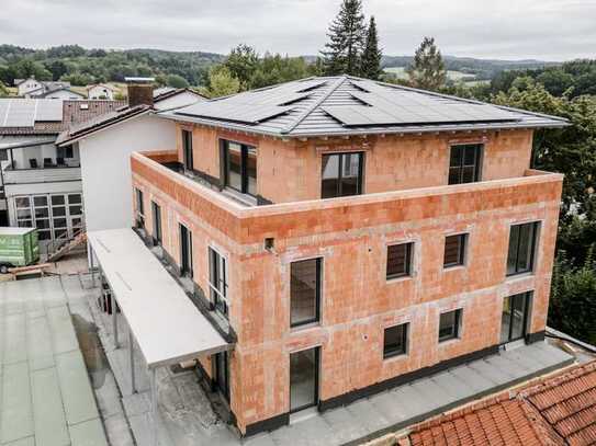 Erstbezug - Altersgerechte 3-Zimmer-Wohnung mit überdachter Terrasse & TG-Stellplatz (WHG 01)