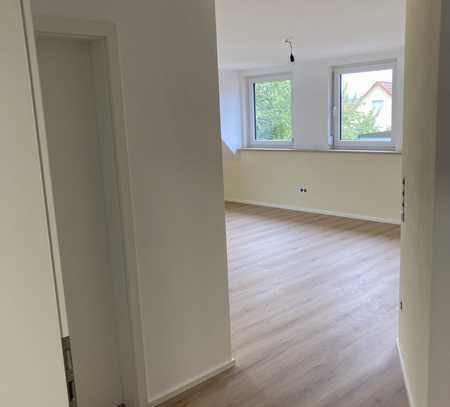 Erstbezug mit Balkon: Exklusive 1,5-Zimmer-Dachgeschosswohnung mit geh. Innenausstattung