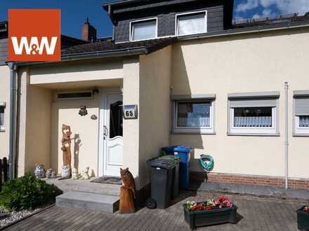 Gepflegtes Reihenmittelhaus mit Grundstück für Garage