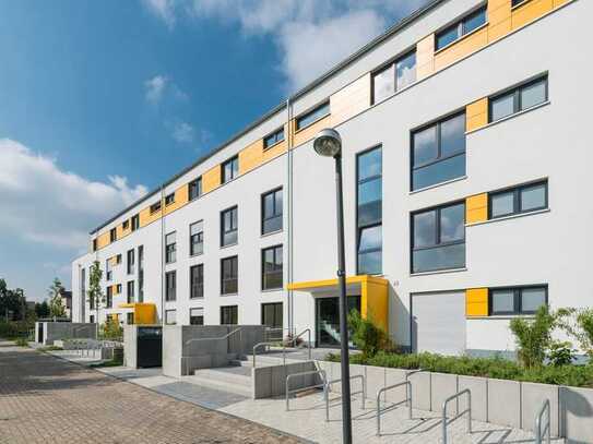 Hochwertige 3-Zimmer Wohnung mit Dachterrasse in architektonisch bemerkenswertem Mehrfamilienhaus