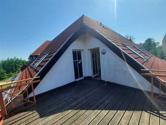 Dachgeschosswohnung mit Balkon