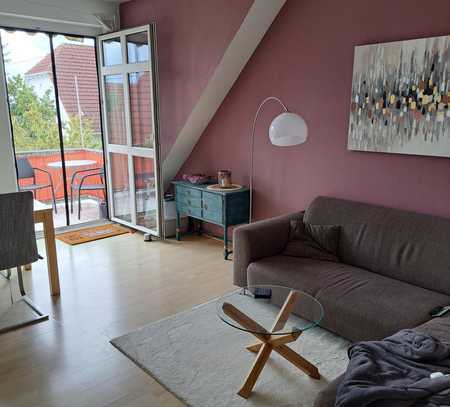 Helle Dachgeschosswohnung mit Südbalkon