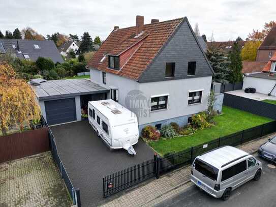 Zweifamilienhaus in Vinnhorst: Riesiger Garten, Pool, Garage & Einliegerwohnung!