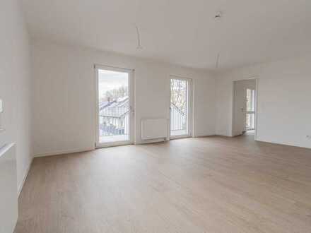 Wohlfeil Immobilien - ERSTBEZUG, lichtdurchflutete 3-Zimmer-Wohnung mit Balkon.