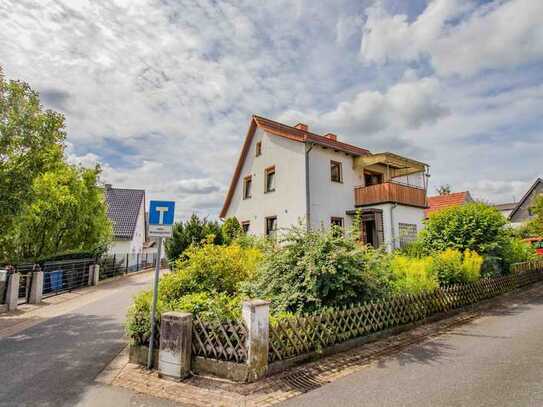 Familienfreundliches Einfamilienhaus mit großem Garten und Garage