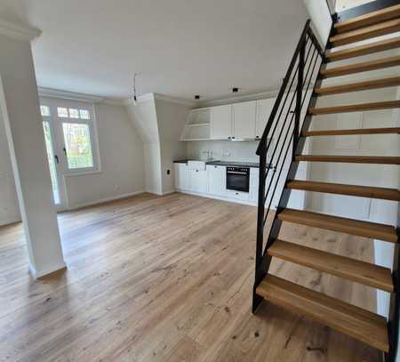Erstbezug nach Sanierung mit Balkon und Einbauküche: Exklusive 3-Zimmer-Maisonette-Wohnung