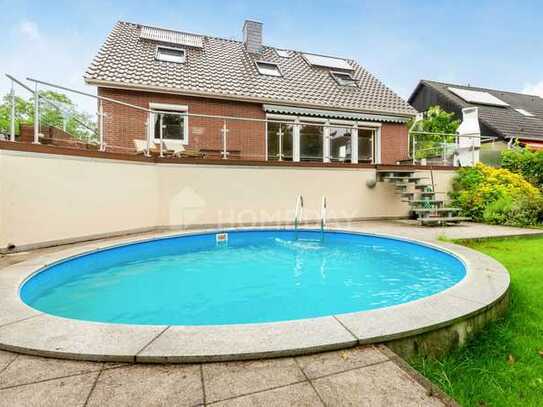 Traumhaftes Einfamilienhaus mit 5 Zimmer, Garten und Pool: Perfekt für Familien