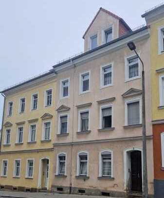 Sanierungsbedürftiges Mehrfamilienhaus im Riesaer Zentrum