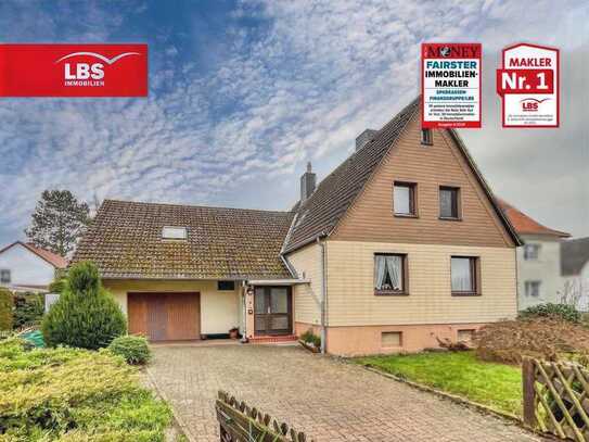 Einfamilienhaus mit großem Grundstück und Garage in Bestlage!