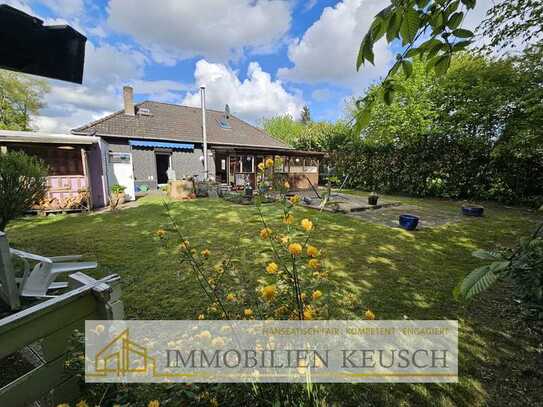 Preis deutlich gesenkt-Bungalow mit Wohlfühl-Kaminofen, offene Küche & Wohn-Essbereich + Traumgrunds