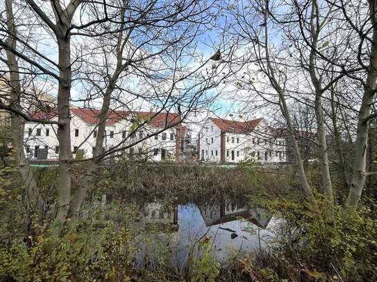 Helles Reihenendhaus mit unverbautem Blick, hellen Räumen und großem Garten