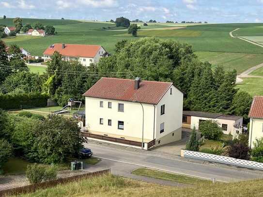 Sonnige 4-Zimmer-Wohnung mit Balkon und Gartenanteil