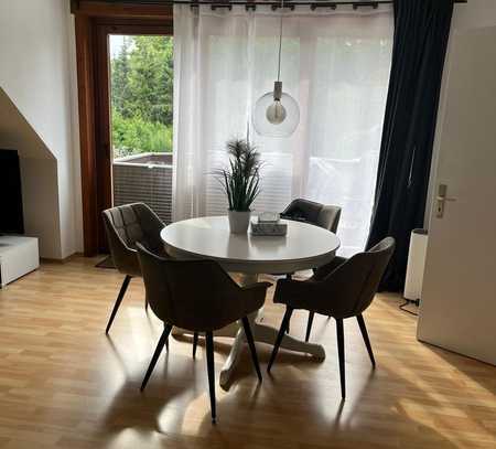 Sanierte Dachgeschosswohnung mit drei Zimmern und Balkon in Hilchenbach