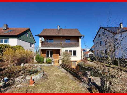 Potenzielles Mehrfamilienhaus mit sonnigem Garten