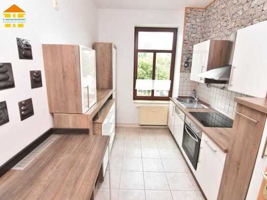 Zentrumsnahe 2-Raum-Wohnung mit Einbauküche, Wintergarten und Außenstellplatz