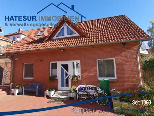 Charmante Maisonette-Wohnung mit Dachterrasse, Balkon und Garten zu vermieten