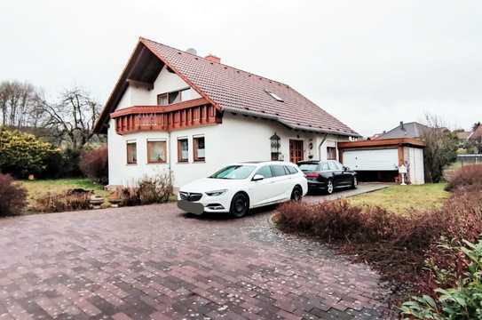 Traumhaftes freistehendes Einfamilienhaus mit großem Garten und Balkonflächen