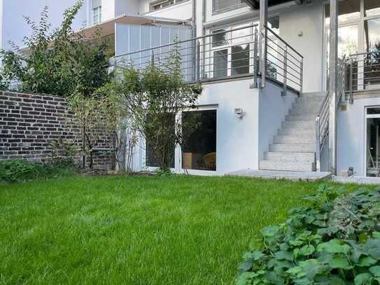 1-Zimmer-Apartment / Studio mit Gartenblick im Souterrain