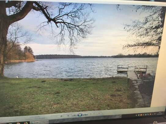 Attraktive 2-Zimmer-Dachgeschosswohnung in Malente mit direktem Seezugang und Seeblick