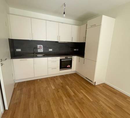 KfW 40-Neubau-Wohnung mit EBK, Balkon, Echtholzparkett, Fahrstuhl, Tiefgarage