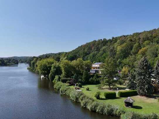 Direktes Wassergrundstück mit Einfamilienhaus