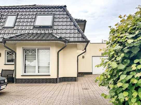 Stil trifft Garten - hochwertige Erdgeschosswohnung in begehrter Lage