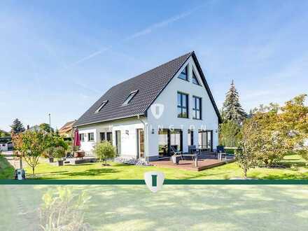 Luxuriöses Einfamilienhaus mit imposanter Grünfläche im Herzen der Gartenstadt