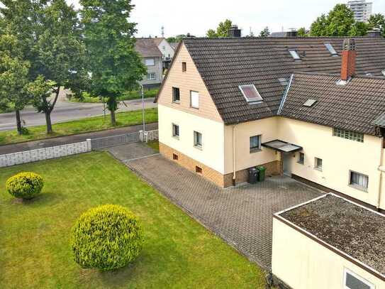 Handwerker aufgepasst! Doppelhaushälfte mit Gestaltungspotenzial und großem Grundstück.