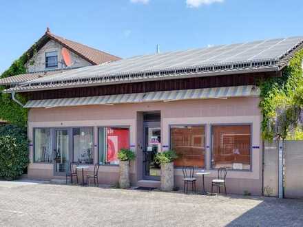 Wörth: Mehrfamilienhaus mit Ladengeschäft und idyllischem Garten!