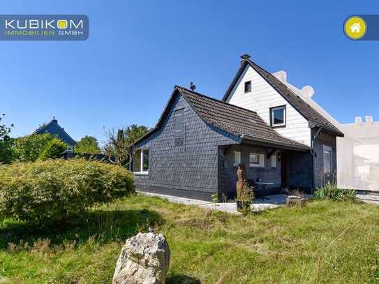 Küppersteg. Einfamilienhaus mit kleinem Grundstück und vier Zimmern.